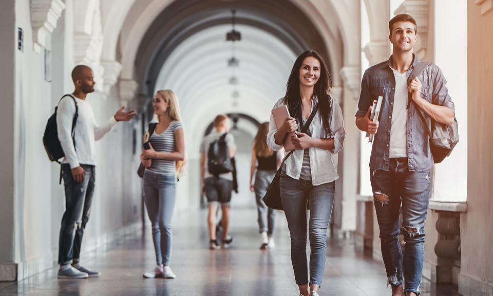 University students walking in a corridor