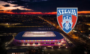 Steaua Stadium as seen from above at nighttime, with a logo