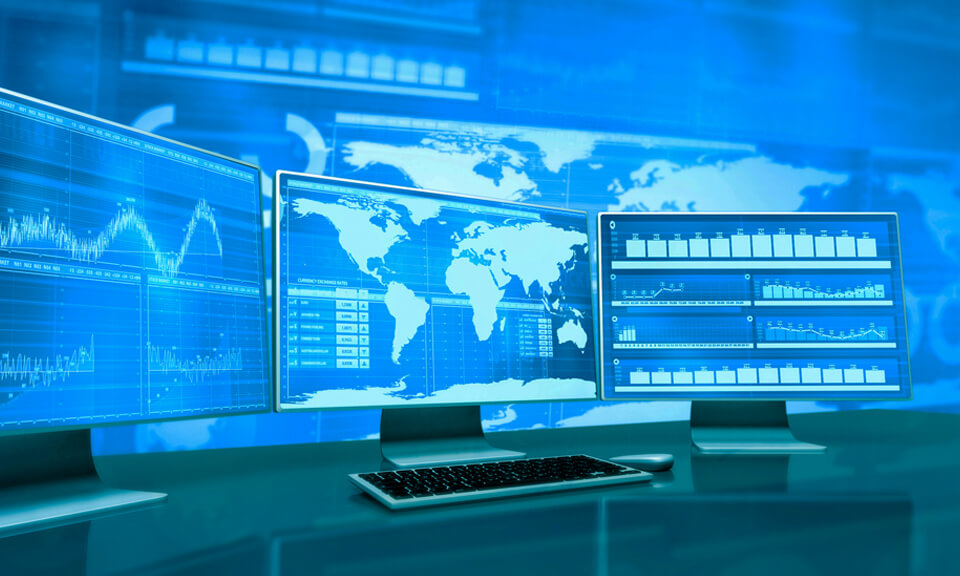 computer screens with world map data