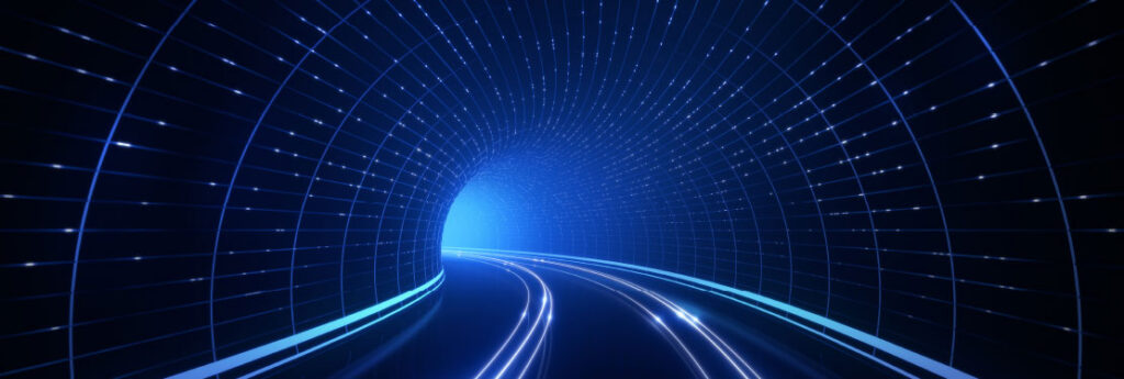 Abstract view of lit fibers traveling through a tunnel