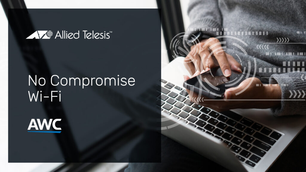 Laptop & mobile phone being used by a male person near a window